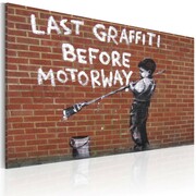 Obraz - Ostatnie graffiti przed autostradą (Banksy) Artgeist